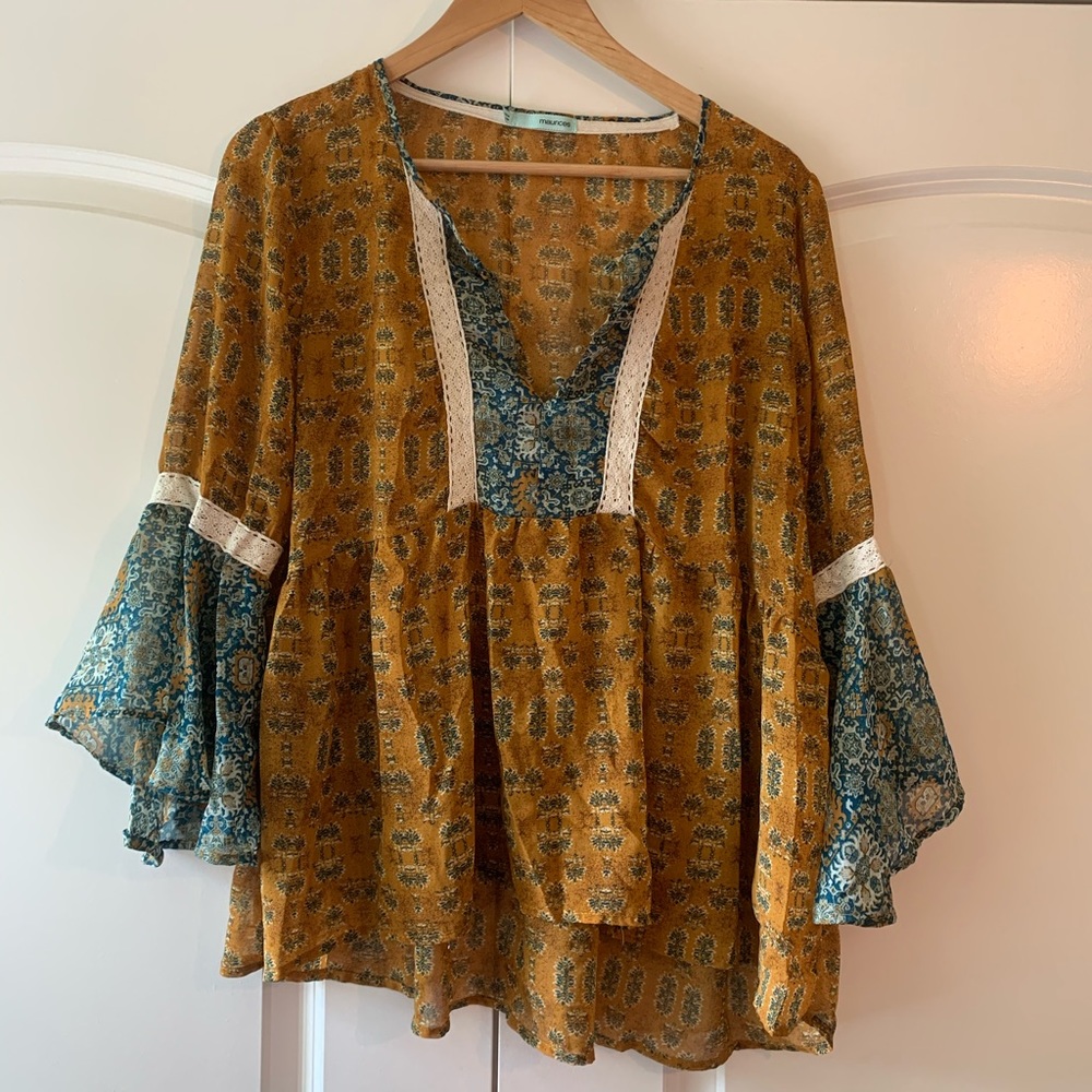Float patterned flair blouse